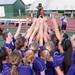 Pioneer cheers as they hold up their district championship trophy for the fist time, Friday May 31.
Courtney Sacco I AnnArbor.com  